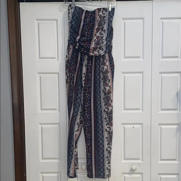 Elegant Blue and Cream Striped Jumpsuit with High Neckline - Picture 1 of 5